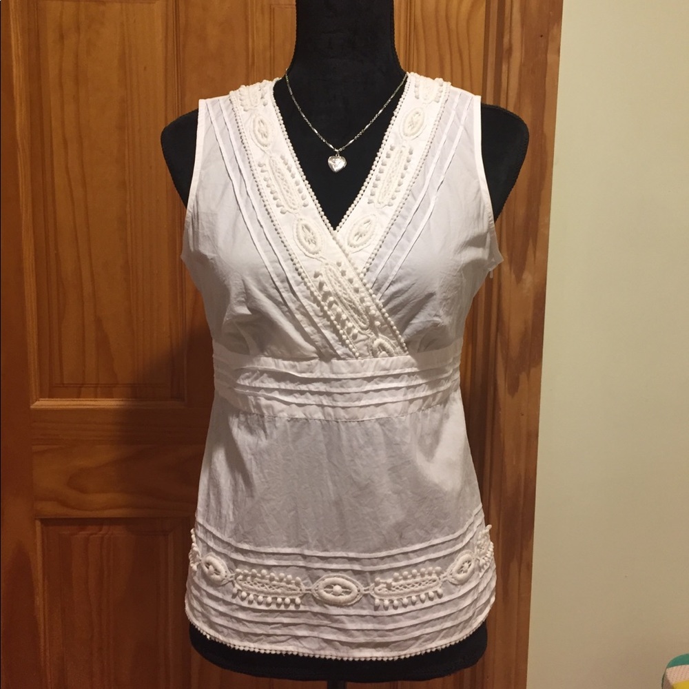Cute, white cotton sleeveless top